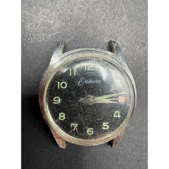 Vintage Men’s Endura Mechanical Date Wristwatch Black Dial Silver Tone No Band - Picture 1 of 10